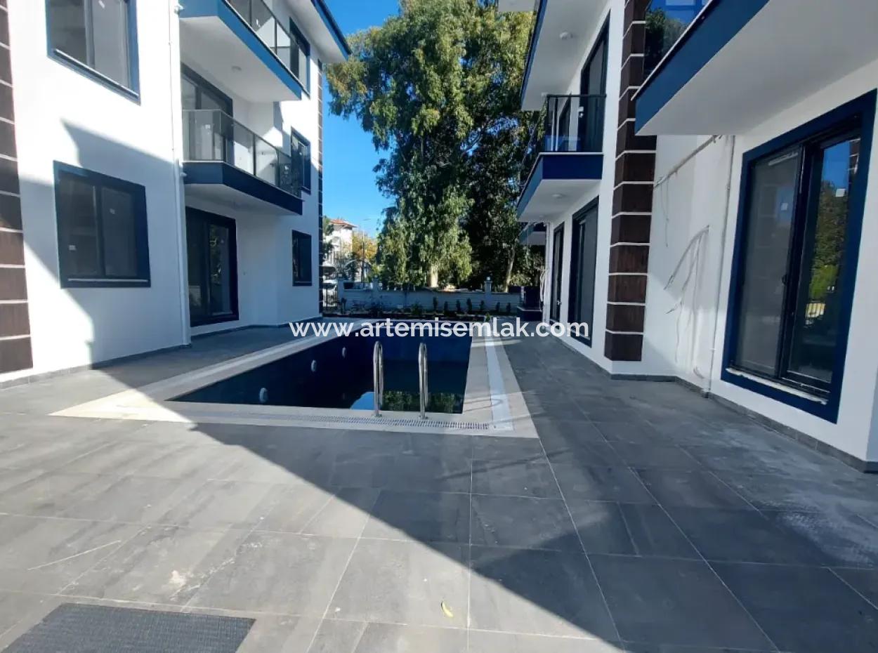 Dalaman Merkezde Havuzlu Sitede Kiralık 1+1 Dire.