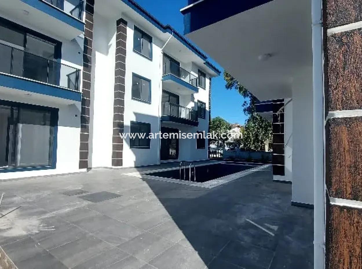 Dalaman Merkezde Havuzlu Sitede Kiralık 1+1 Dire.